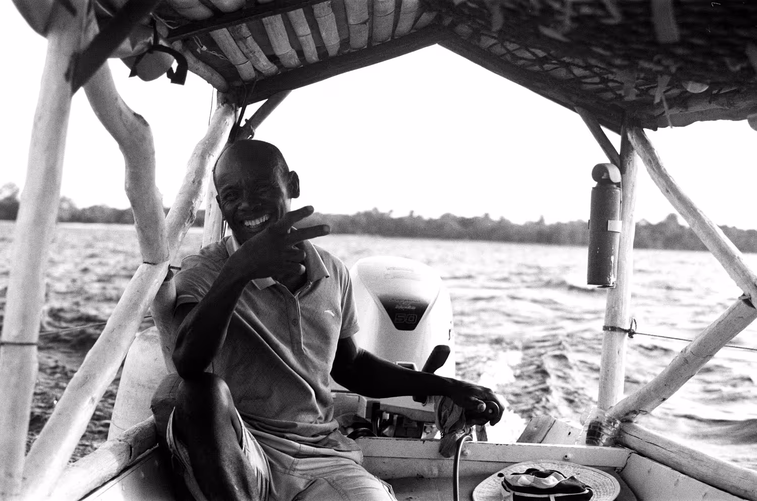 Nolah at the helm on the Canal des Pangalanes